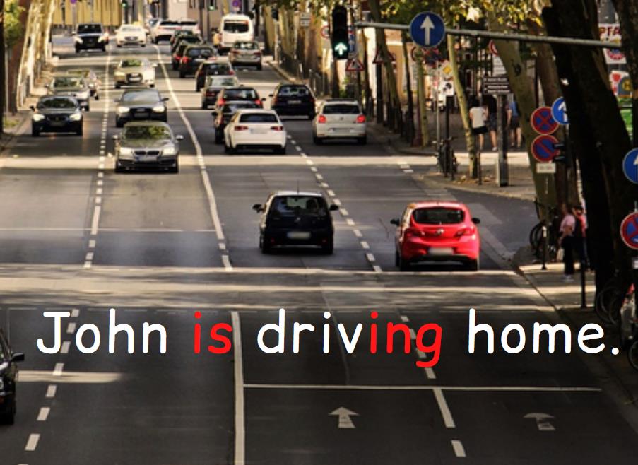 Cars on a busy road, text John is driving home